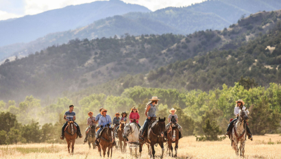 Group of people riding horses