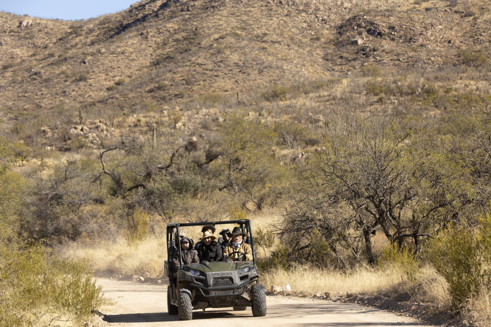 people in a jeep at Rancho de la Osa