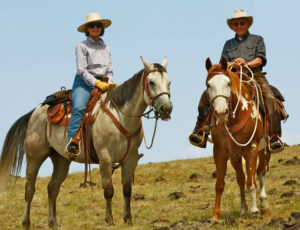 Couple on a trail ride at 7D Ranch