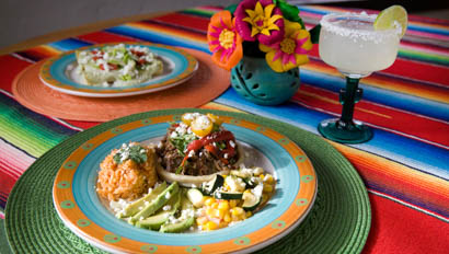 Plate of food and a margarita at Circle Z Ranch
