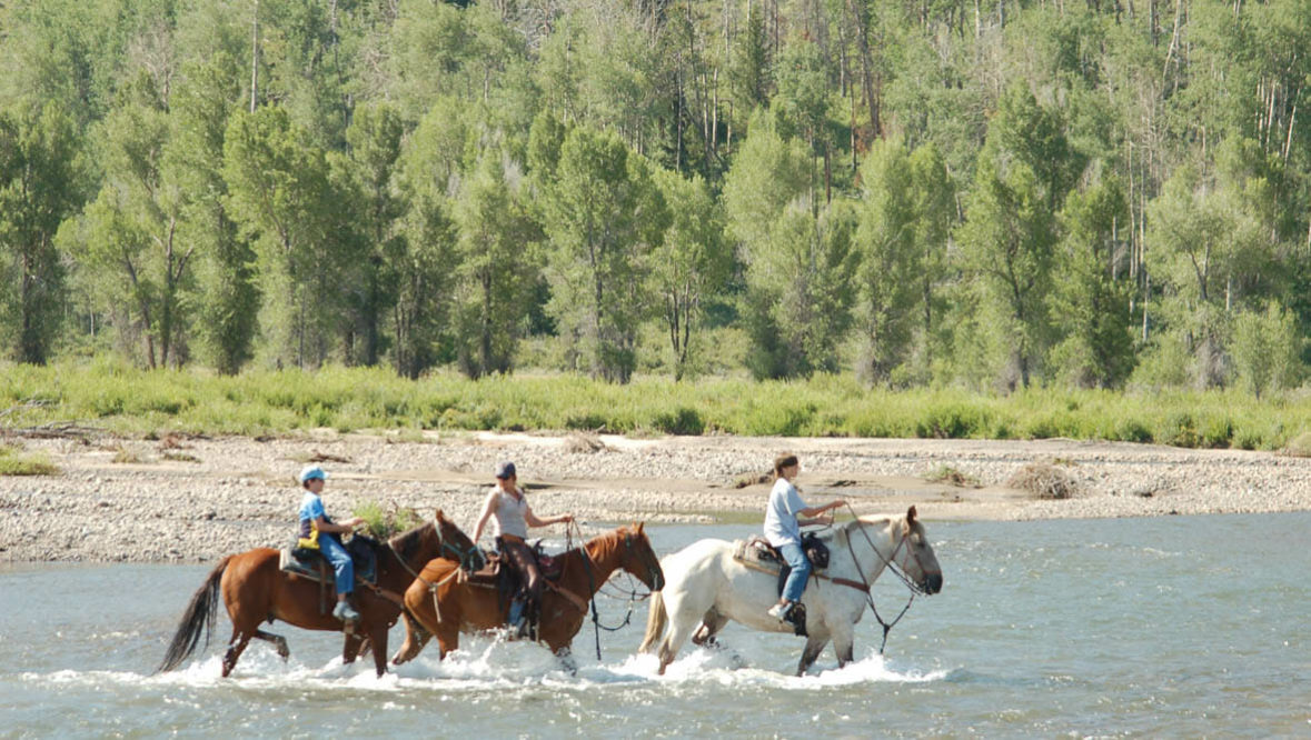 River crossing trail ride at Goosewing Ranch