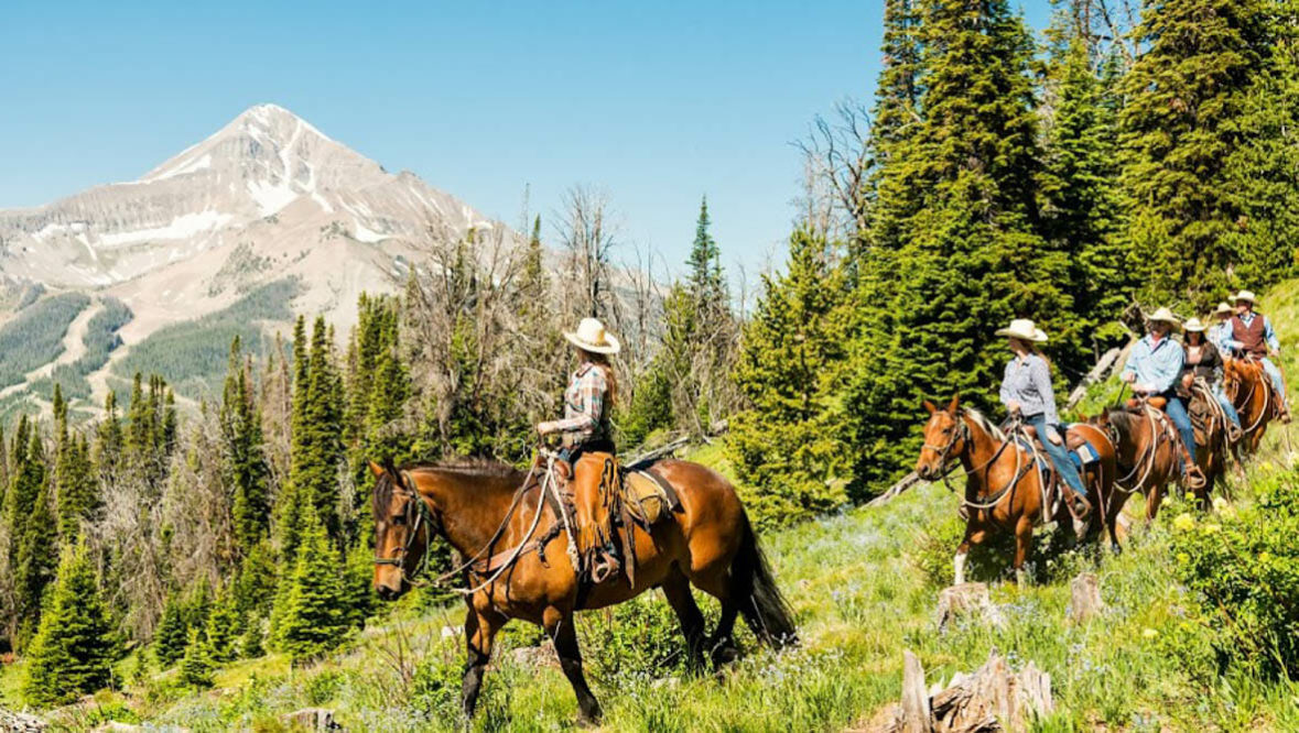 Family trail ride at Lone Mountain Ranch
