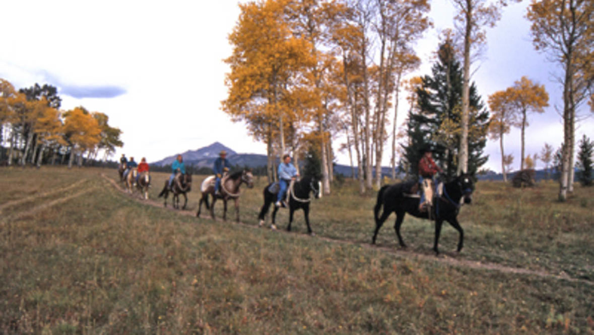 Trail ride during the fall at Lone Mountain Ranch