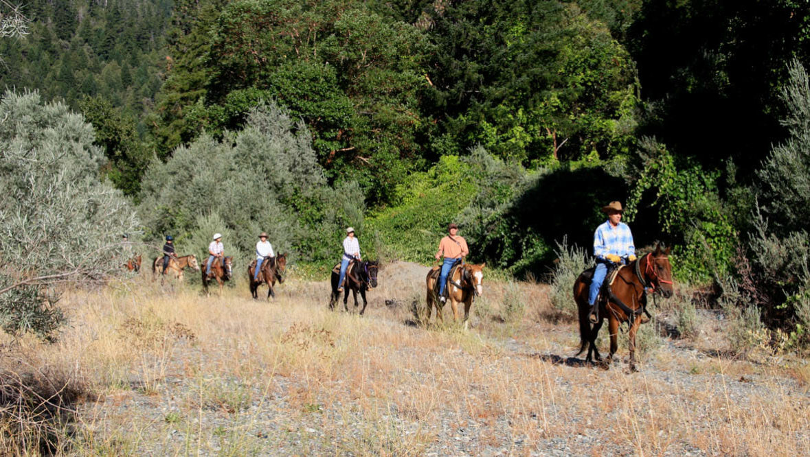 Family trail ride at Marble Mountain Ranch