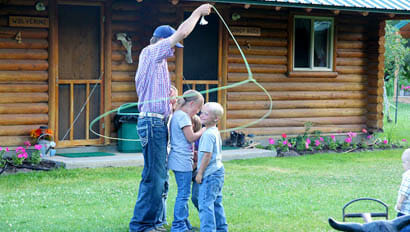 Kids being roped by a Cowboy at McGarry Ranch