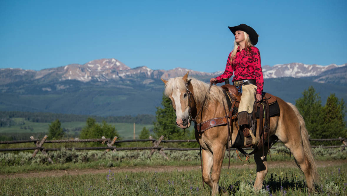 Cowgirl on a horse at Parade Rest Ranch