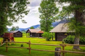 cabins with mountains in the back