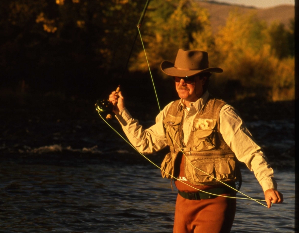 man fly fishing