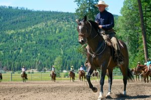 man riding a horse