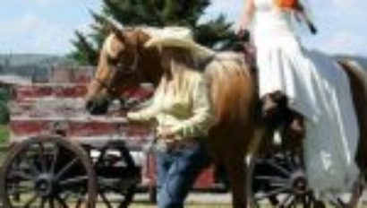 Bride sidesaddle on a horse