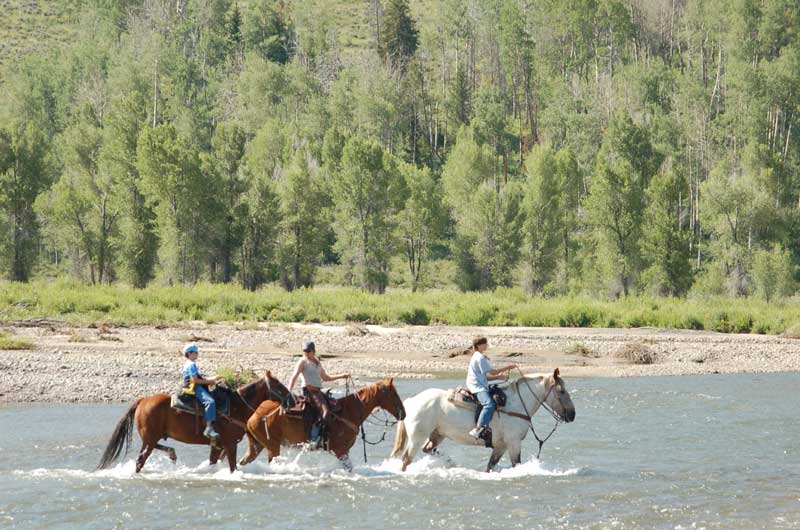 Goosewing-Ranch-Riding-the-River - Eco-tourism
