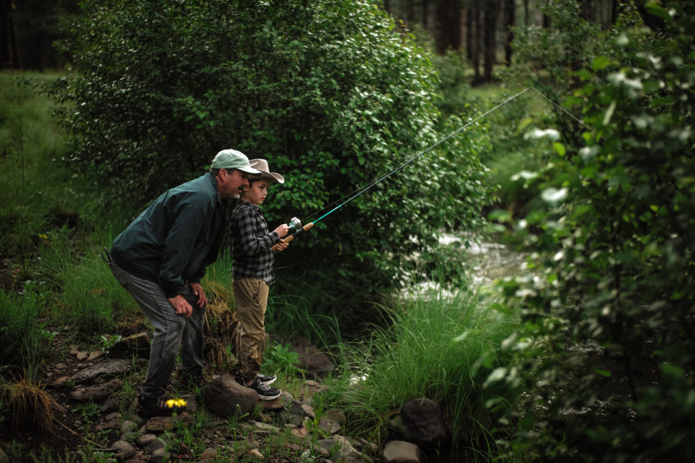 Grandpa & grandson fishing at Sprucedale Guest Ranch